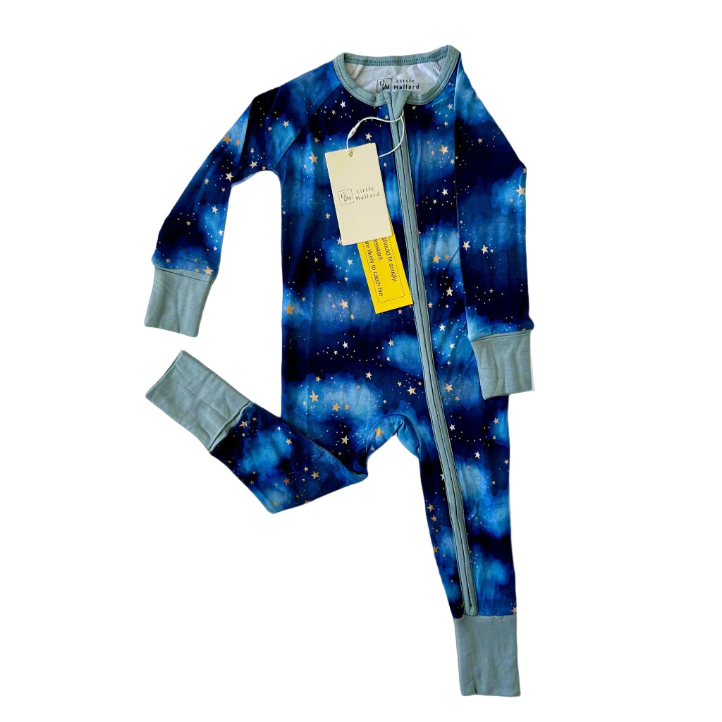 Soft baby convertible pajama/ onesie with galaxy pattern on a white background designed by Little Mallard
