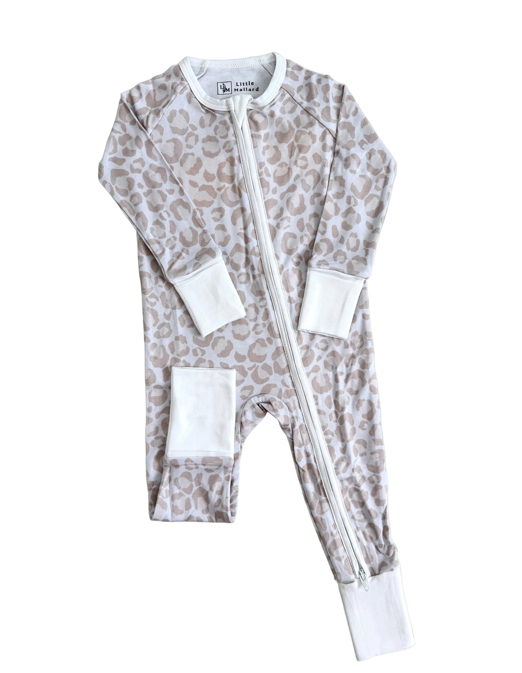 Baby onesie with leopard print and white accents on a white background. Pajama is soft and breathable bamboo pajamas 