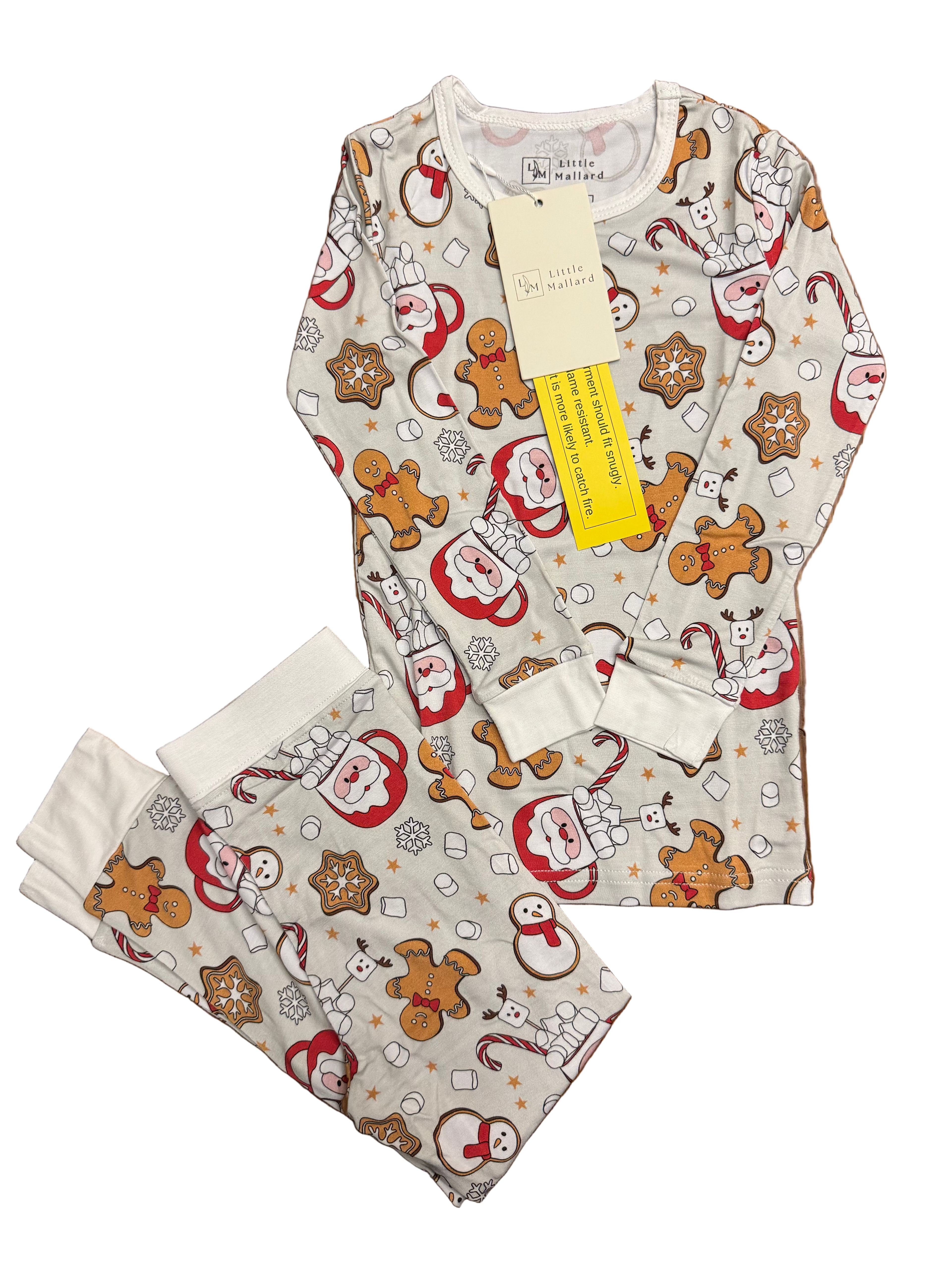 Toddler bamboo pajamas with santa, cookies, ginger bread, marshmallows, snowflakes and candycane. Bamboo pajamas are super soft, breathable and great with sensitive skin. 