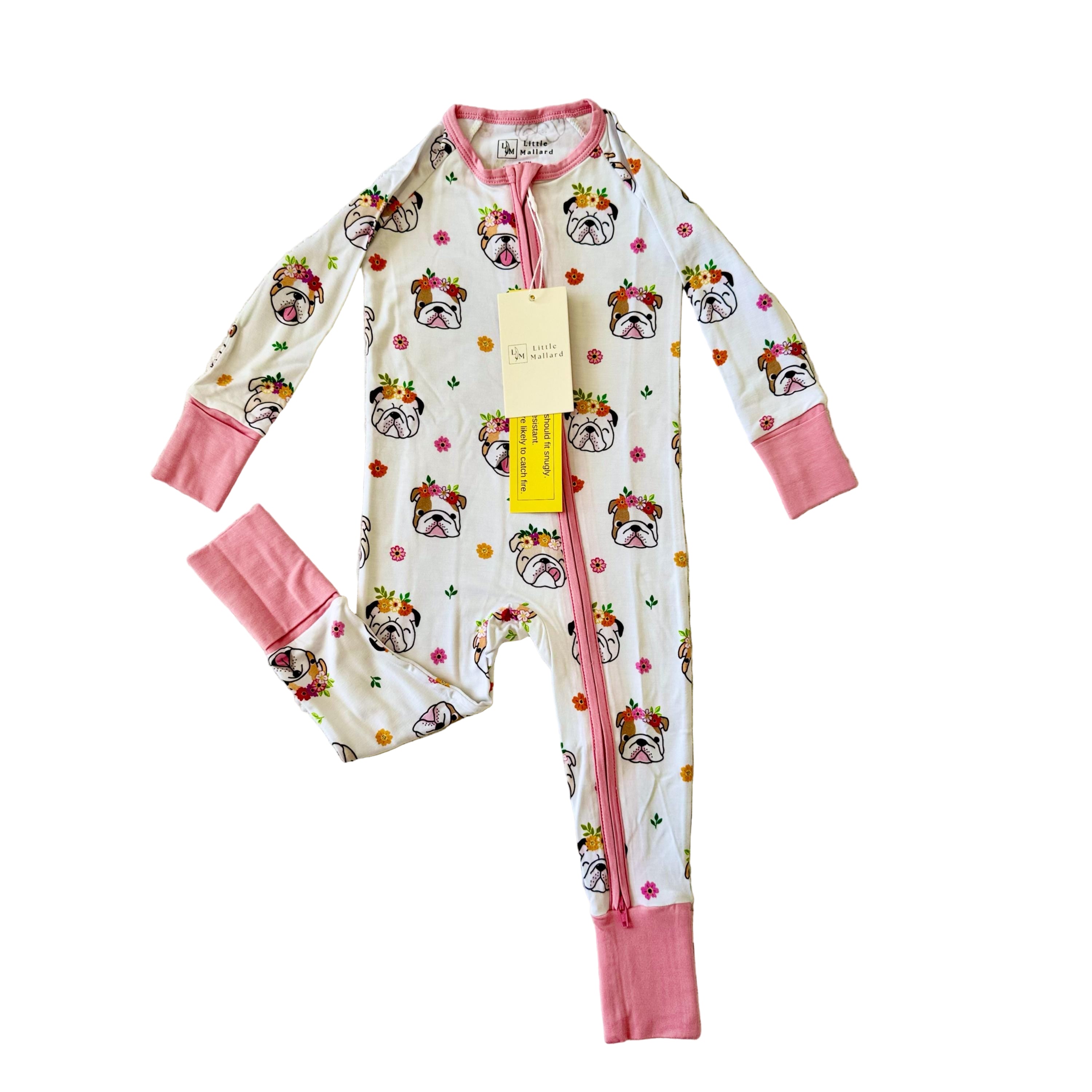 White bamboo convertible baby pajama super soft with bulldog/dog print with multicolor flowers and pink zipper, cuffs and convertible feet. 