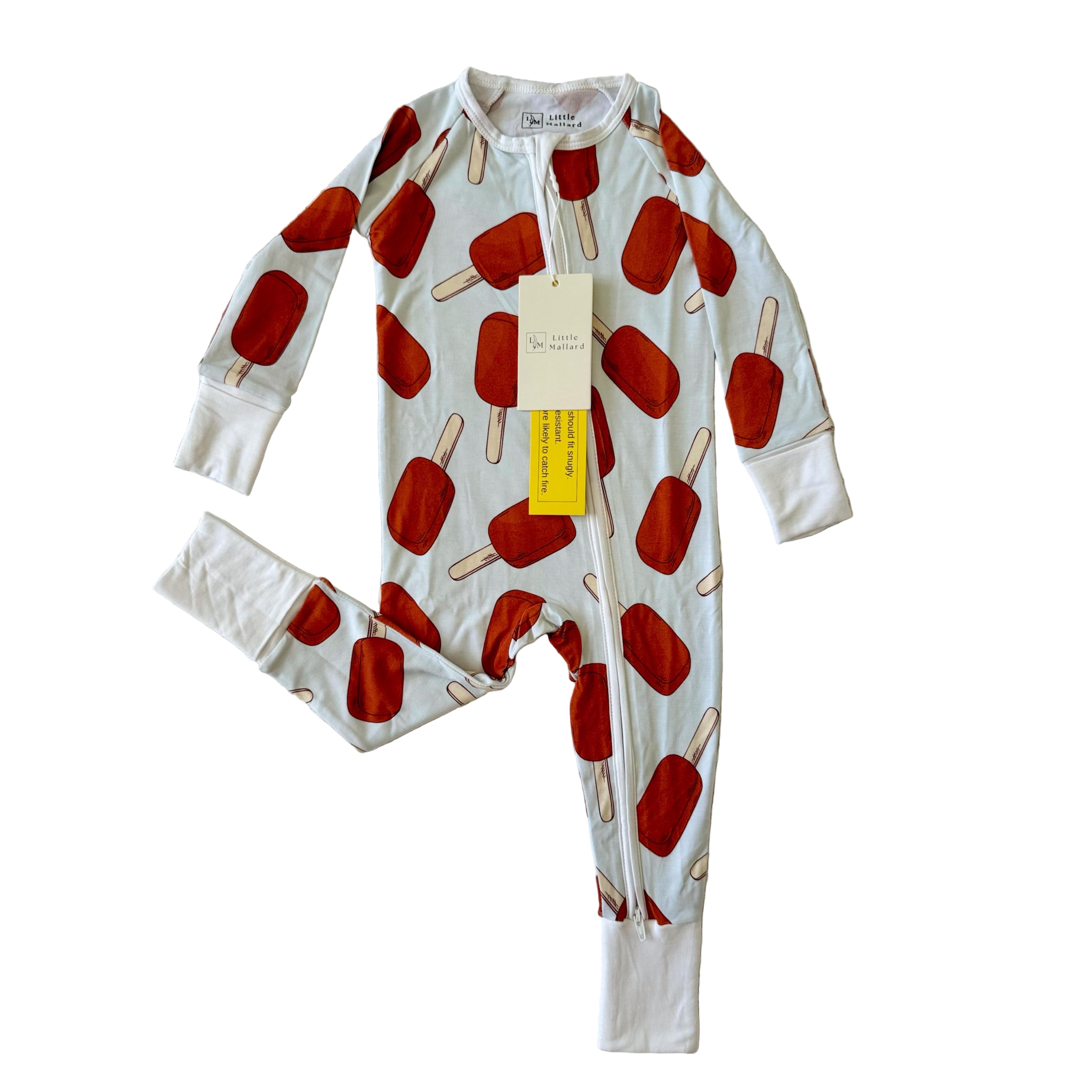 Little Mallard Soft Bamboo baby sleeper with light blue background with brown fudge bars. 